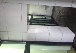 Реконструкция навесного вентилируемого фасада с алюминиевыми кассетами 